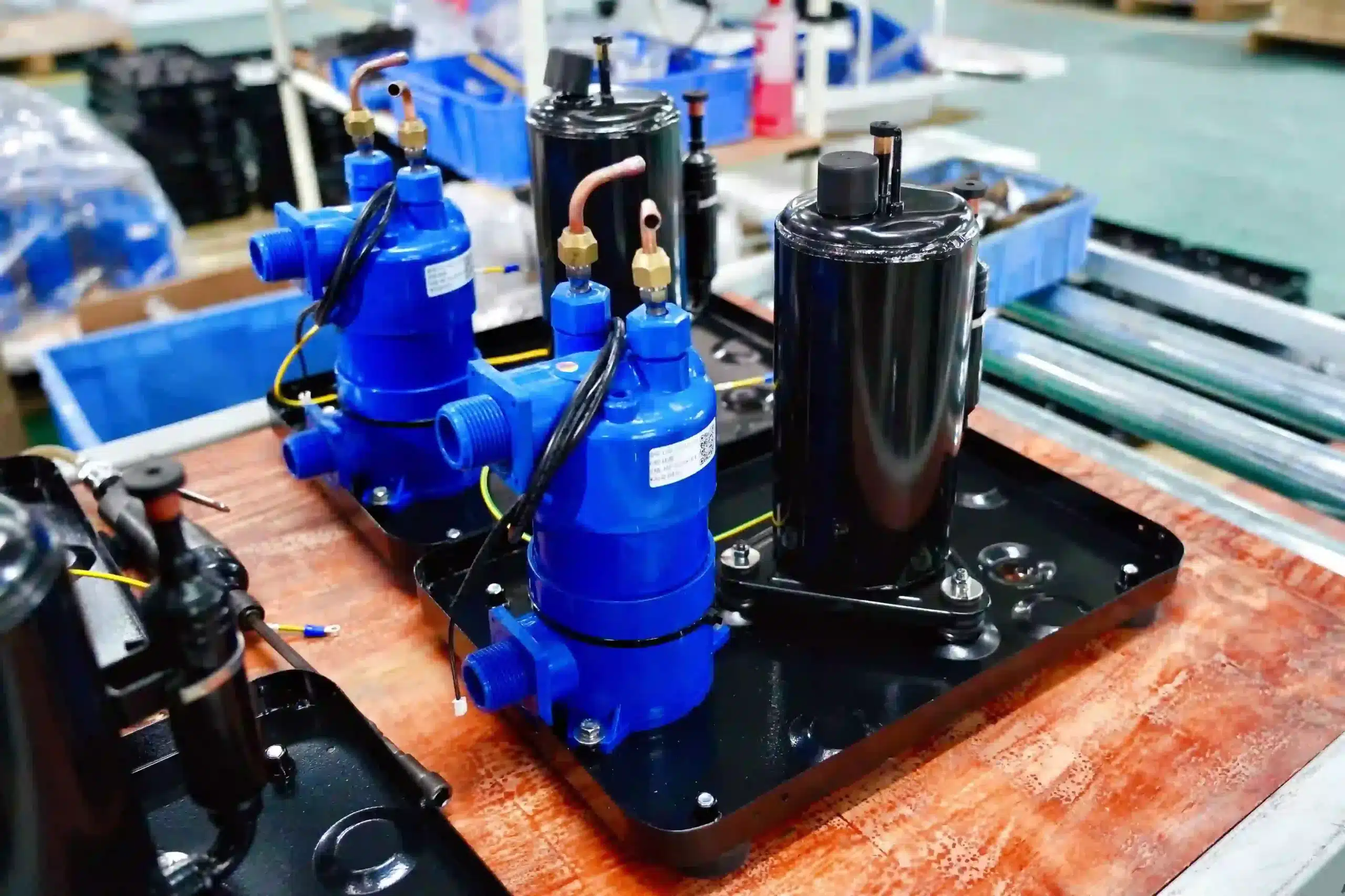 Technician assembling components relevant to a cold plunge chiller spare parts kit