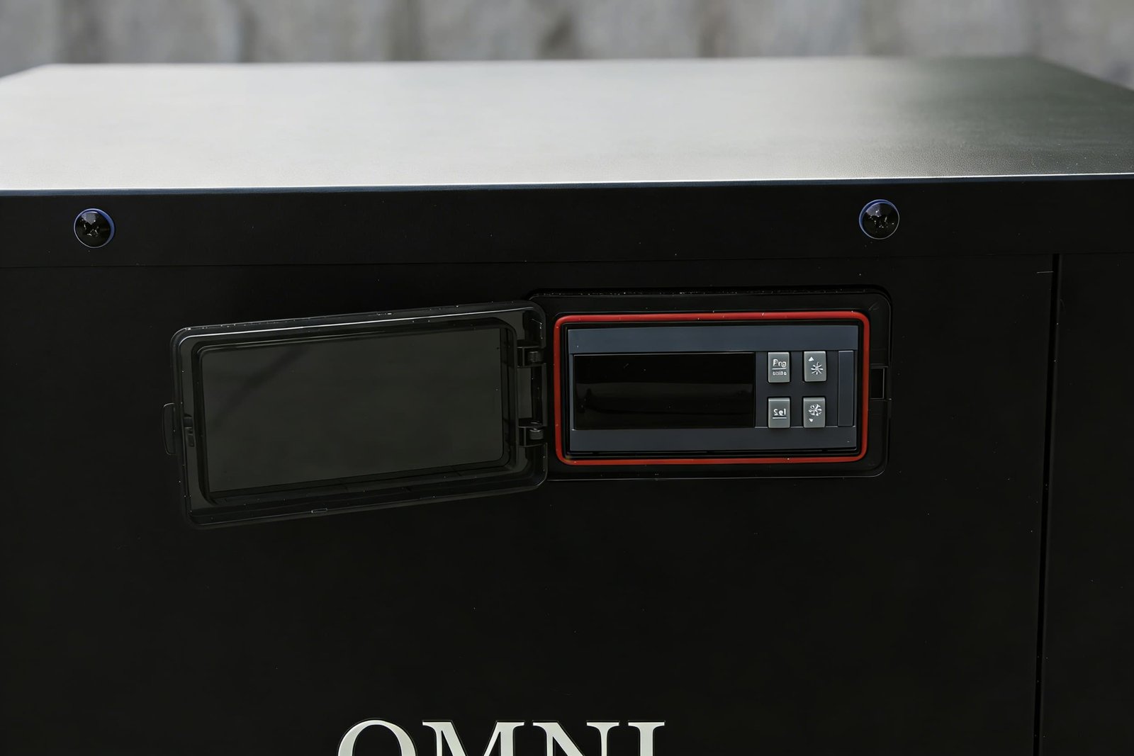 OMNI chiller digital controller and protective cover in a close-up product photograph