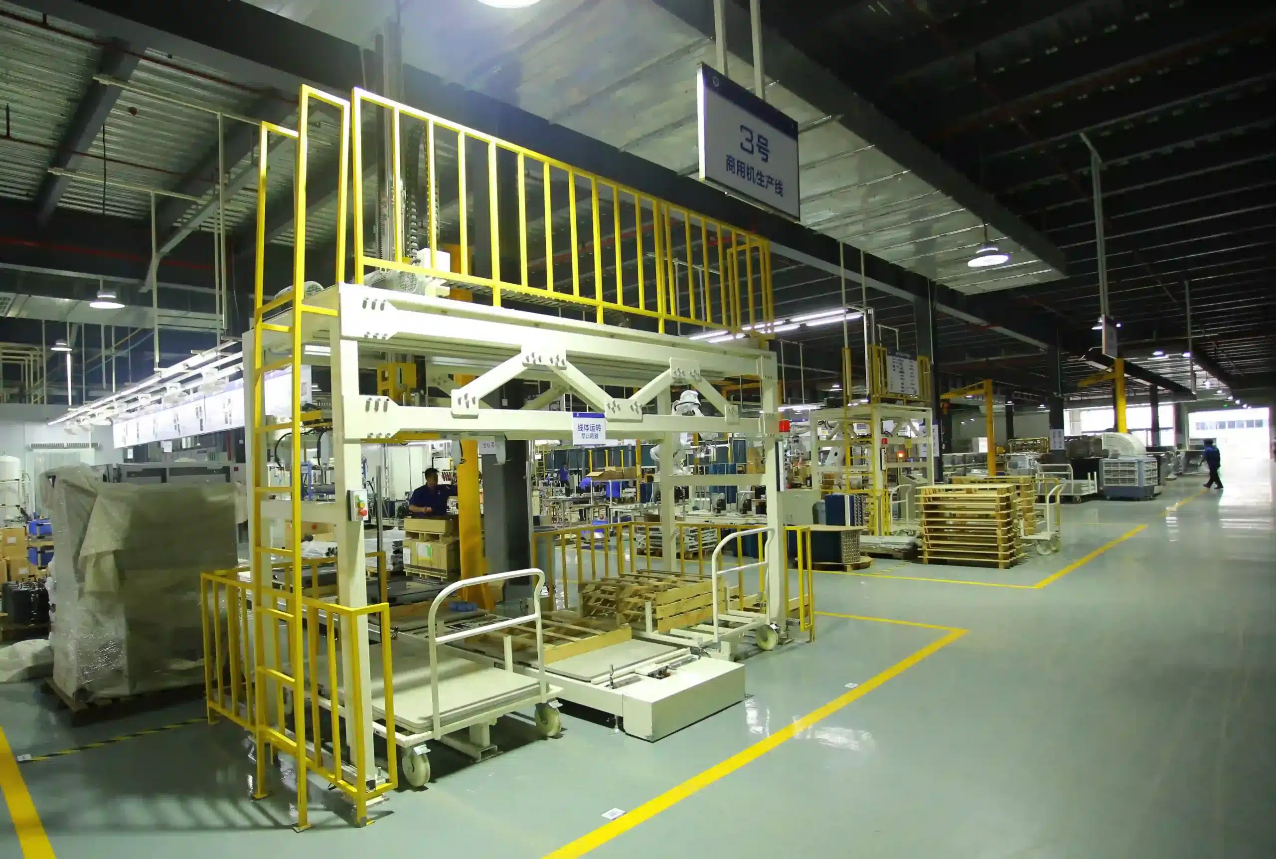 Cold plunge chiller assembly area with industrial production equipment