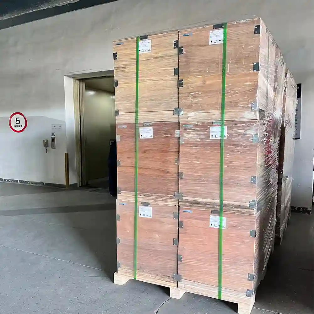 Stacked wooden crates reviewed during cold plunge chiller receiving inspection