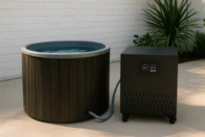 Cold plunge chiller connected to a wooden ice bath tub outdoors