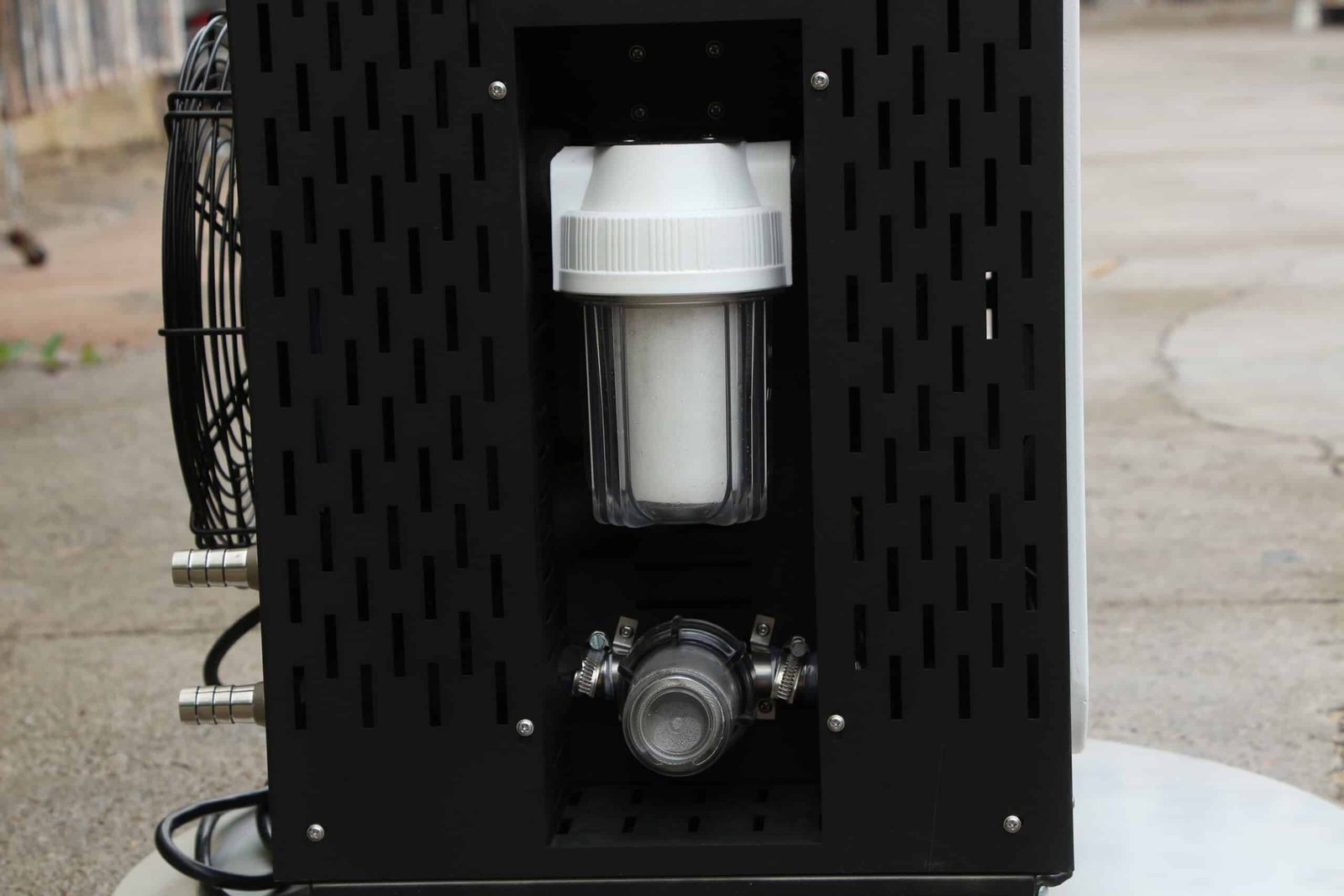 External cartridge filter and pump assembly on an OMNI chiller