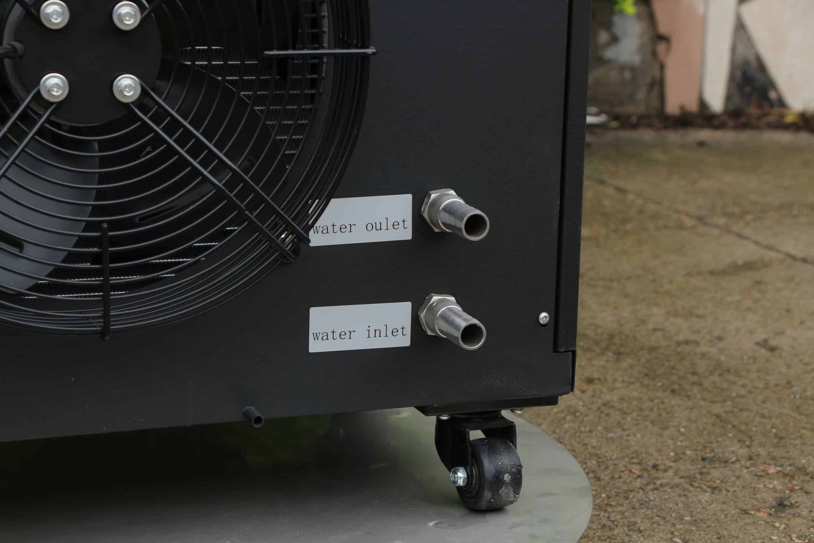 Water inlet and outlet labels used to define a cold plunge chiller flow rate measurement boundary