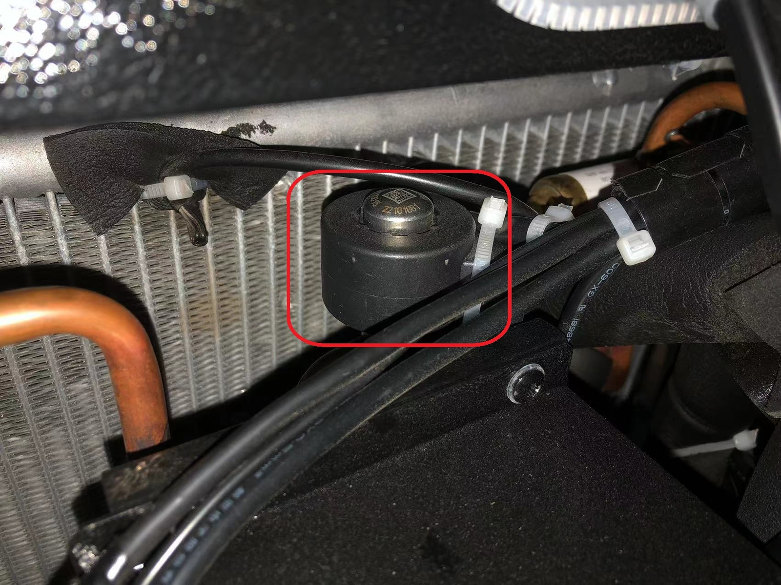Close-up of an electronic expansion valve (EEV) used to optimize cold plunge chiller efficiency and refrigerant control.