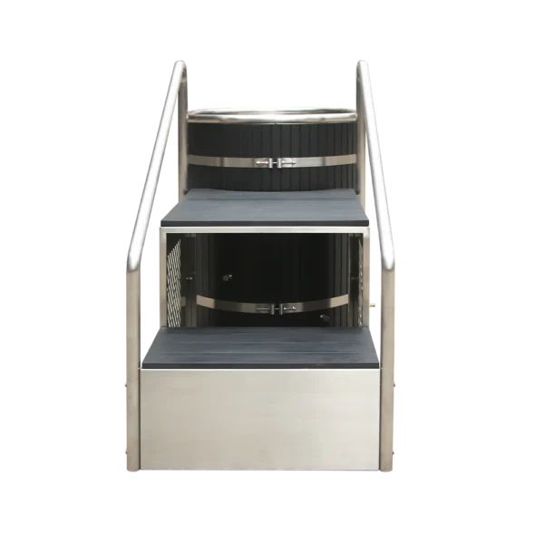 Front view of metal tub for ice baths, showcasing black steps and dual stainless steel handrails for secure access