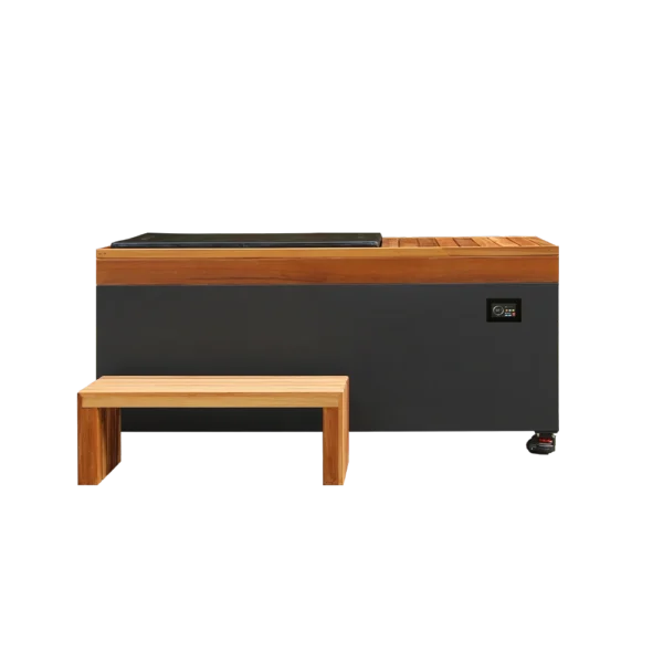 Side profile of cold plunge pool with natural wood bench, black steel body, and digital control for ice bath recovery