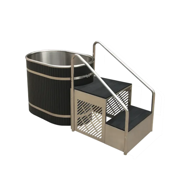 Angled side view of metal tub for ice baths, equipped with sturdy black steps, stainless steel barrel, and handrail