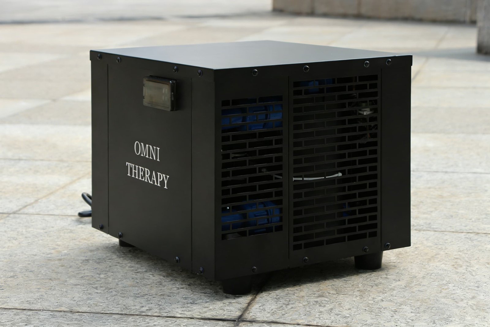 Ventilated condenser enclosure used in an air-cooled cold plunge chiller route