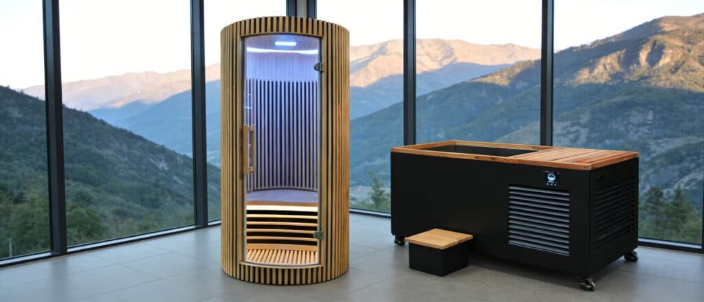 Commercial sauna cold plunge combo system in a professional gym — stainless steel cold plunge tub paired with infrared sauna room for elite facility recovery