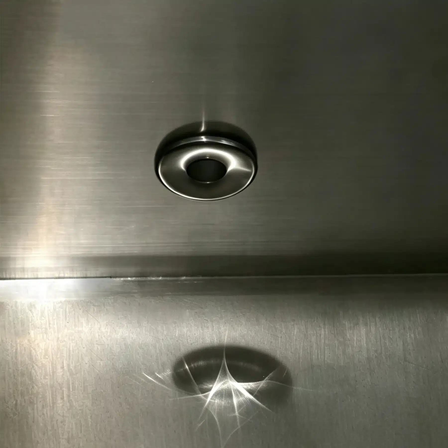 Stainless steel tub drain fitting reviewed during indoor cold plunge installation planning