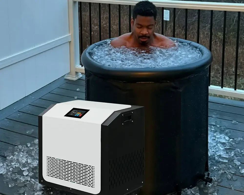 OMNI Therapy CHU-10-RV model chiller unit, designed for 0°C ice bath recovery, placed beside an outdoor soaking tub